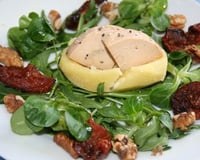 Pommes de terre au foie gras fondantes, roquette et tomates confites