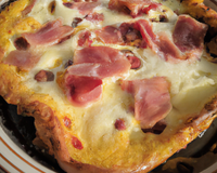 Clafoutis au jambon cru, mozzarella et pignons