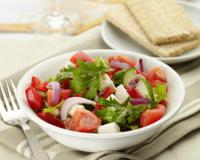 Une salade fraîcheur au Caprice des Dieux et tomates.