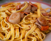 Saint-Jacques flambées au saumon fumé