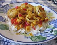 Un bon riz basmati au calamars et des poivrons coupés en petit morceau!