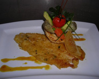 Filets de sole panés à l'anglaise, mari chaires de légumes printaniers