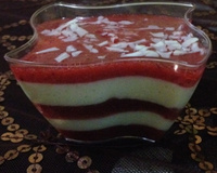 Panna cotta au chocolat blanc et son coulis de framboises au basilic