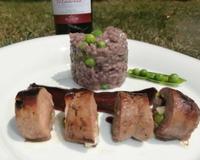 Un foie de veau farci à l'ail frais et petits pois au Madiran.