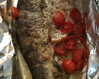 Filets de truite en papillote sur lit de légumes