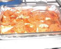 Il s'agit d'un filet de perche avec une fines couches de tomate et de la chapelure à l'huile d'olive.