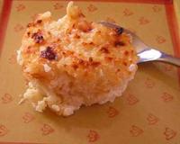 Un riz au lait fondant sous une croûte dorée. Un délicieux souvenir d'enfance.