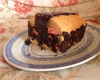 Bûche à la mangue aux saveurs de tonka et de fraise des bois