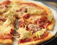 Pizza aux cœurs d'artichauts, coppa et Sublime Filante Giovanni Ferrari