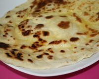 Je vous confirme à travers ma recette de naan au fromage que c'est bien de la vache qui rit que l'on met à l'intérieur !