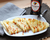 Crêpes parfumées au rhum et caramel à l'orange