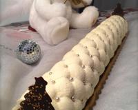 Sa base est un brownie, pour apporter du croquant il y a un feuilleté praliné, pour la douceur, une mousse mascarpone avec une note aromatique d'amande…