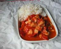 Cubes de seiche dans une sauce poivrons / tomates