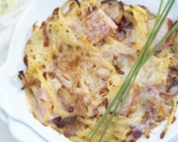 Gratin de pommes de terre aux oignons avec carré de porc et gruyère AOC
