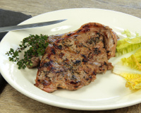 Tranche de gigot d'agneau au barbecue