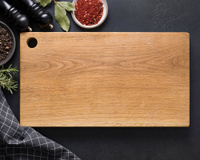 Pourquoi vous devriez définitivement troquer votre planche à découper en plastique contre du bois selon cette experte