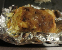 Papillotes de saumon au miel, curry et compotée d'oignons