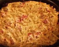 Gratin de pâtes au jambon assaisonné d'une pointe de noix de muscade