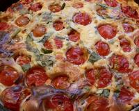 Clafoutis de tomate cerise au chèvre et basilic