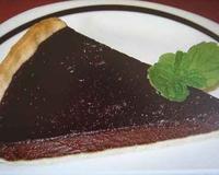 Une délicieuse tarte au chocolat à déguster froide ou tiède.