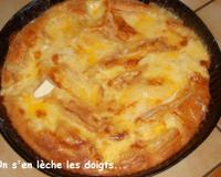 Pâte levée garnie de fromage affiné de l'Avesnois.