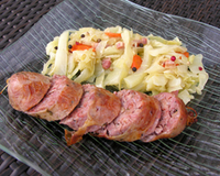 Andouille de Jargeau braisée au Sauvignon, embeurrée de choux