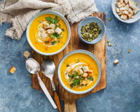 Velouté de carottes aux lentilles corail, cumin et lait de coco