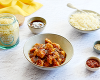 Dés de poulet caramélisés, sauce pimentée