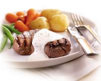 Steak grillé accompagné de sa sauce au philadelphia