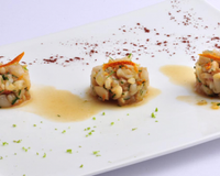 Coquilles saint-jacques crues cuites en tartare au confit d'orange
