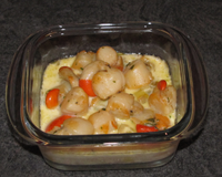 Mini cocotte de noix de pétoncle sur lit de fondue de poireau