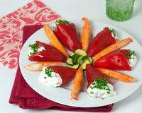 De délicieux piquillos acoompagnés d'une chantilly de curry et de bâtonnets Grands Coraya.
