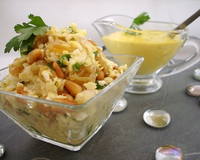 Voici une entrée originale et rafraîchissante à base de chou-fleur cru, d'oignons, de raisins secs et de pignons de pin, le tout accompagné d'une sauce au curcuma et…