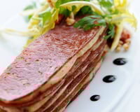 Millefeuilles de diots fumés et mousseline de reblochon à la graine de moutarde, salade de pissenlits aux noix