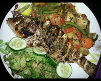 Dorade au four sur lit de pommes de terre