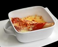 Un gratin d'endives très gourmand, apporté par le fromage à raclette RichesMonts.