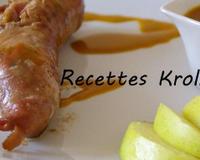 Un mélange d'andouillette avec des pommes et du cidre en plats.