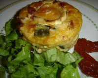Minis clafoutis aux courgettes et tomates marinées et fromage de chèvre