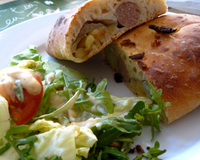 Mbriulate, spécialité sicilienne (Petit pain farci)