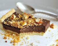 Délicieuse tarte, très équilibrée en goût, l'ajout d'oeufs dans l'appareil permet une texture un peu flan qui se tient bien, les éclats…