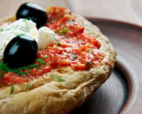 Connaissez-vous le koukouvagia cette incroyable recette grecque à base de pain rassis et de tomates