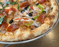 C’est quoi la fameuse moitié-moitié, la pizza mythique de Marseille ?