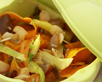 Salade tiède de carottes et de fenouil à l'orange sanguine, raisins. Vinaigrette à la fleur d'oranger, argan et harissa.