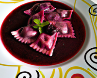 Raviolis à la farce papillonnante au jus de cerise