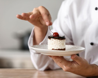 D'où vient l'expression "la cerise sur le gâteau" ?