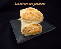 Je vous propose des crêpes salées farcies à la purée de carottes.Une purée à laquelle on ajoute du fromage fondu et du curry.