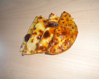 Mezzaluna  du Sud (aux chèvre,poivrons, et tomates séchées)