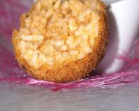 De savoureuses croquettes de riz au bon goût de mozzarella.