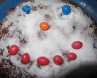 Plusieurs crêpes une sur l 'autre recouvertes de chocolat décoration clown enneigé