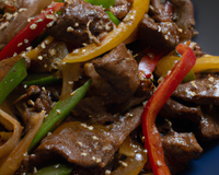 WokBœuf sauté aux poivrons et graines de sésame